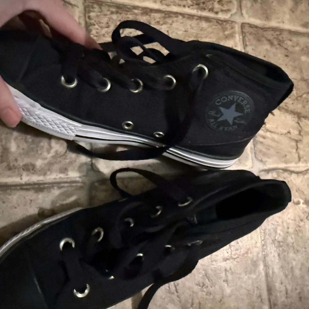 Converse Black High-Tops with White Soles